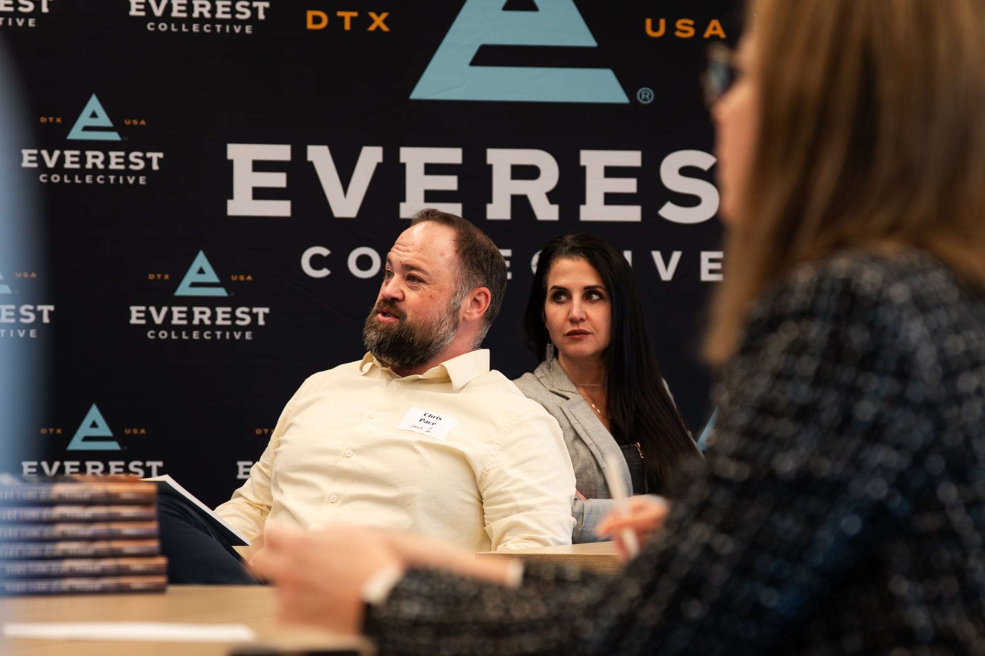 A leader sharing with his table at The Collective