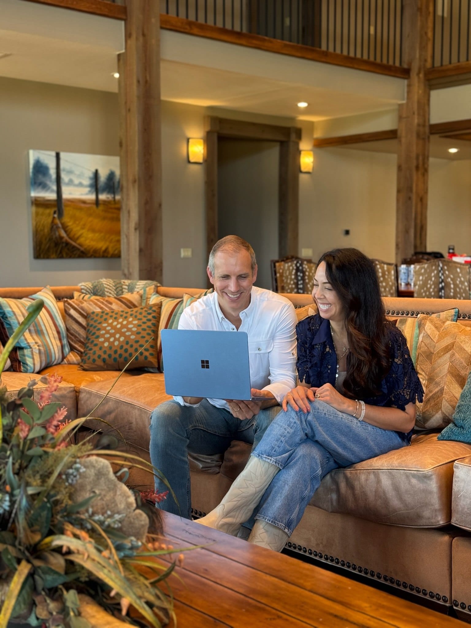 Mike Fromhold and Brittany Tipton working through a plan together on a laptop