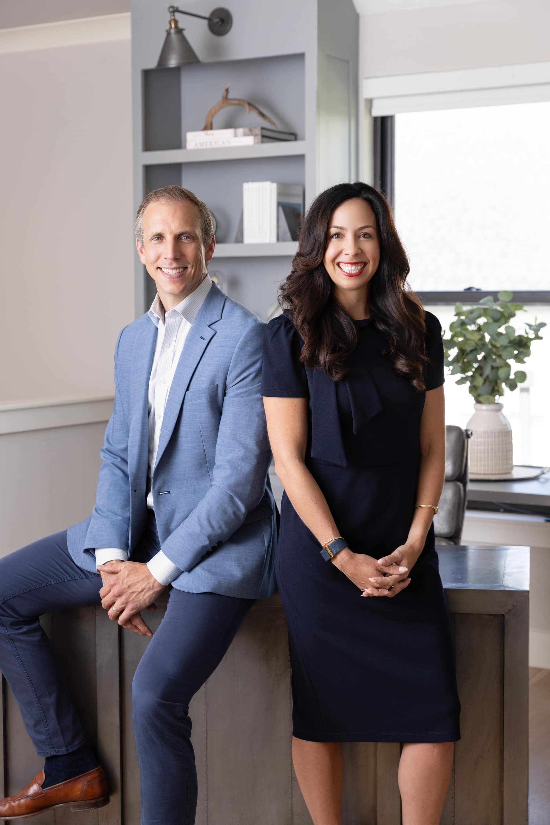 Mike Fromhold and Brittany Tipton, co-founders of Everest Collective, in their office