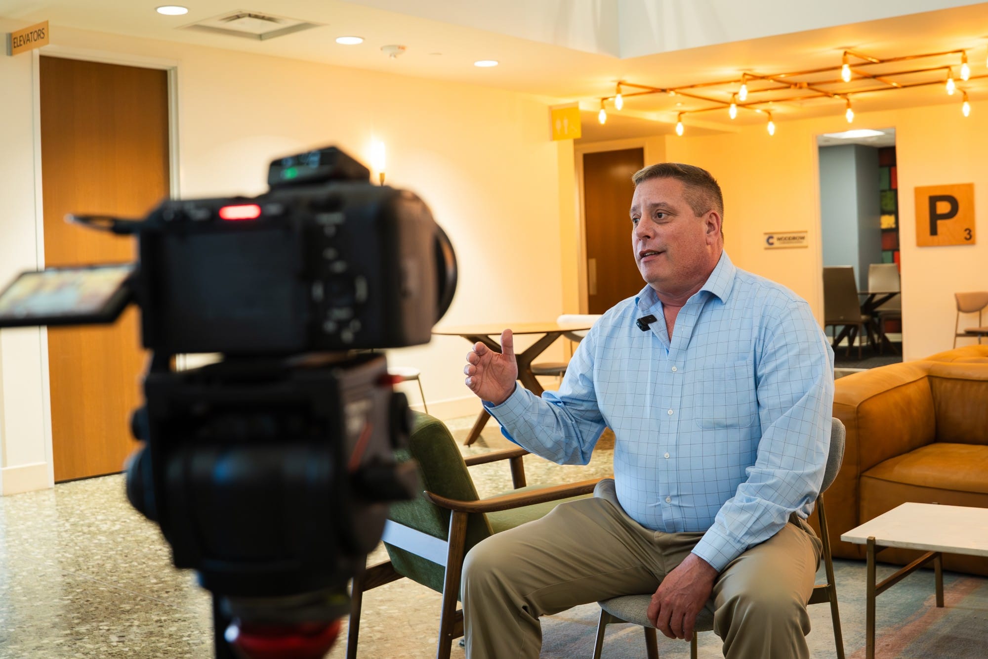 A Dallas–Fort Worth leader sharing his story on camera