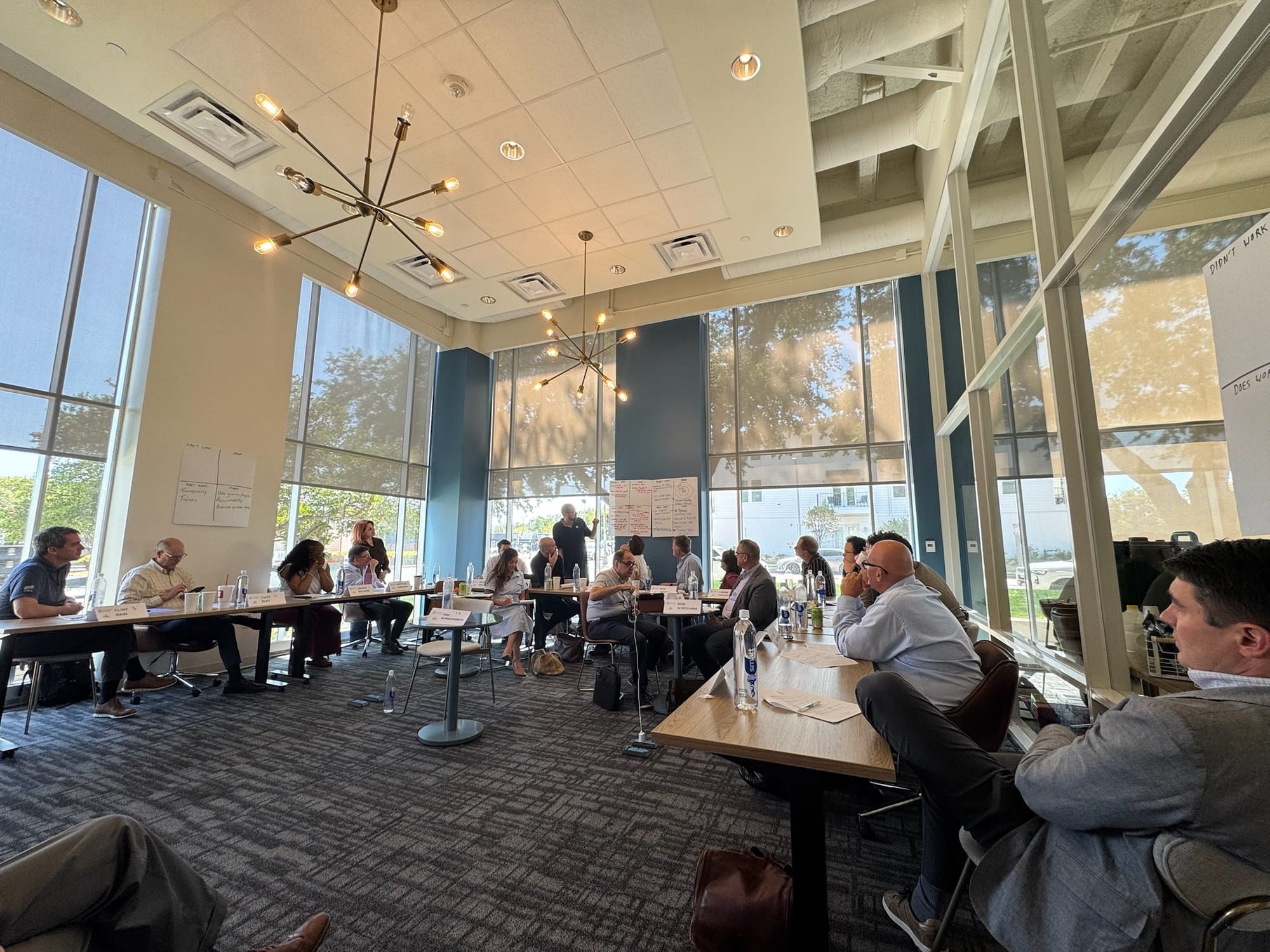 A university cabinet at work in a bright retreat room