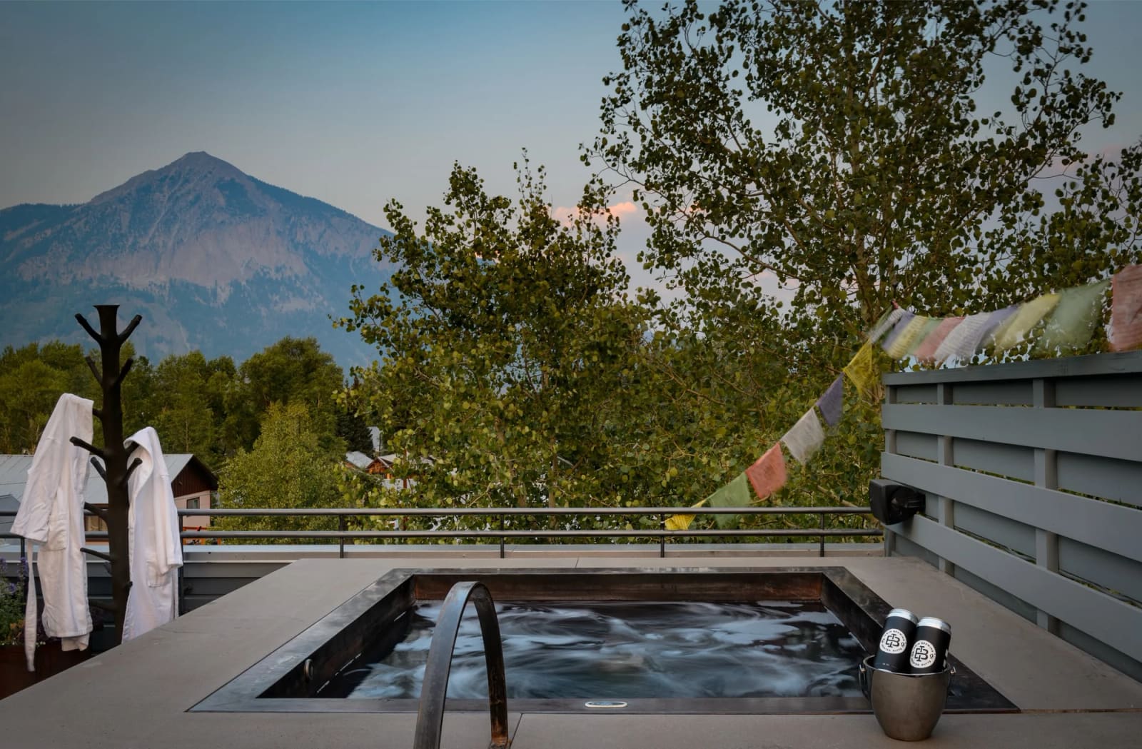 Rooftop hot tub with a view of Mount Crested Butte