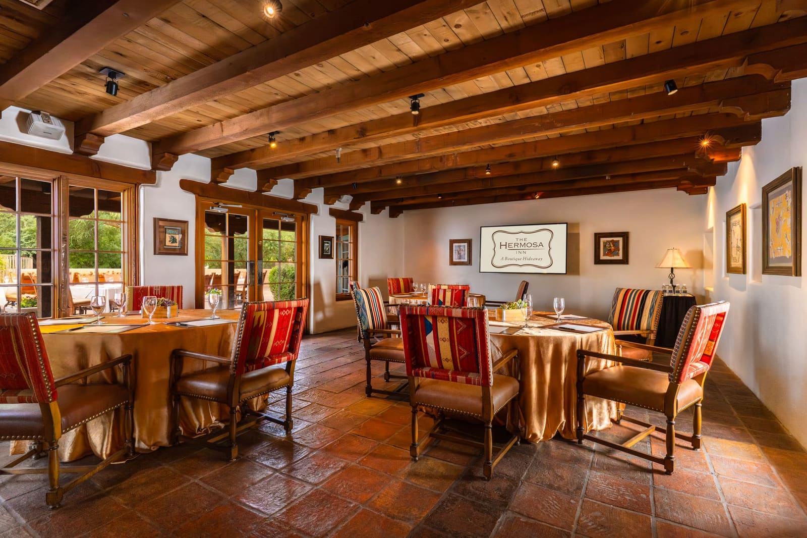 Meeting room with beamed ceiling, Saltillo tile and French doors to the patio