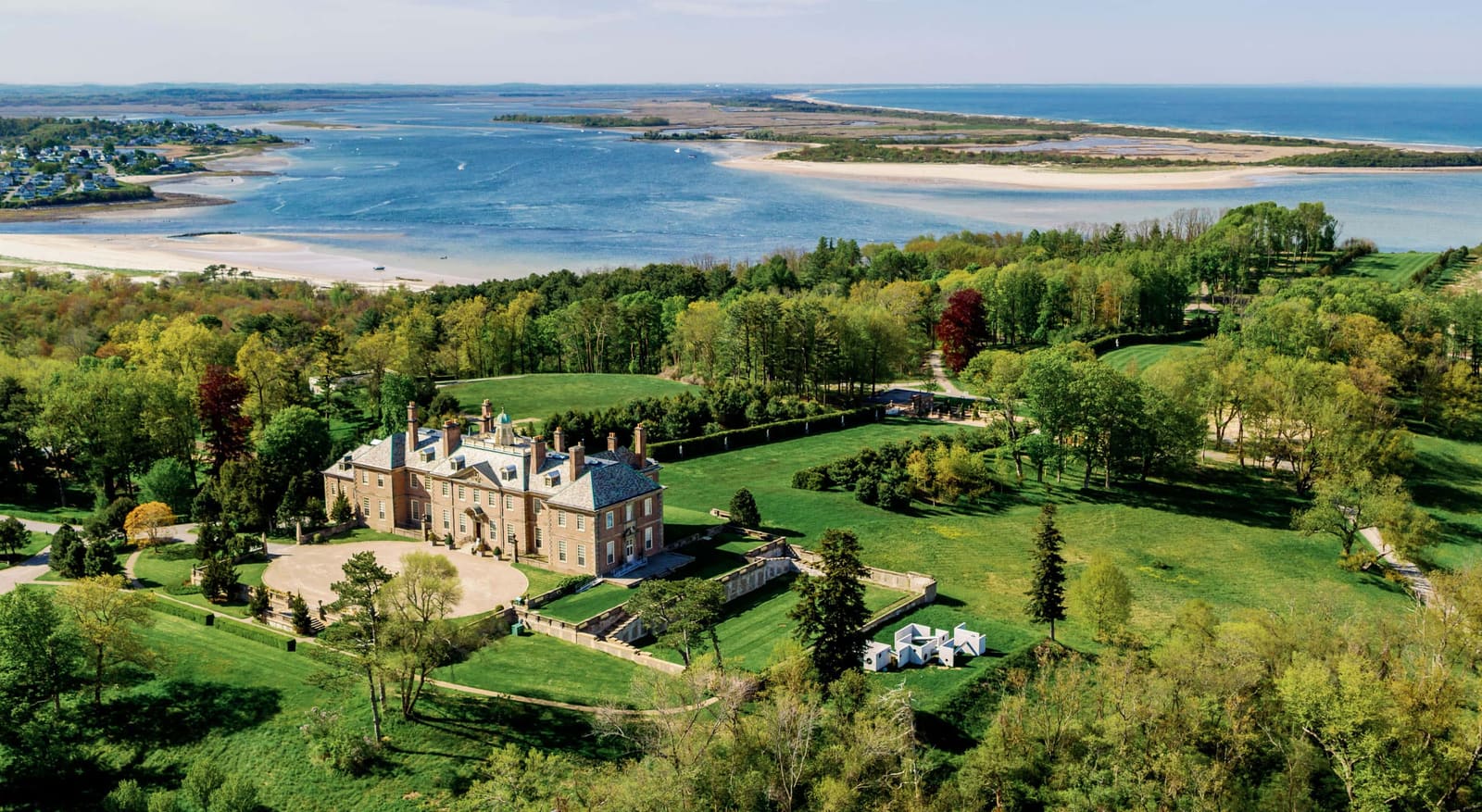 Aerial view of the Crane Estate Great House with the bay, dunes and Atlantic beyond