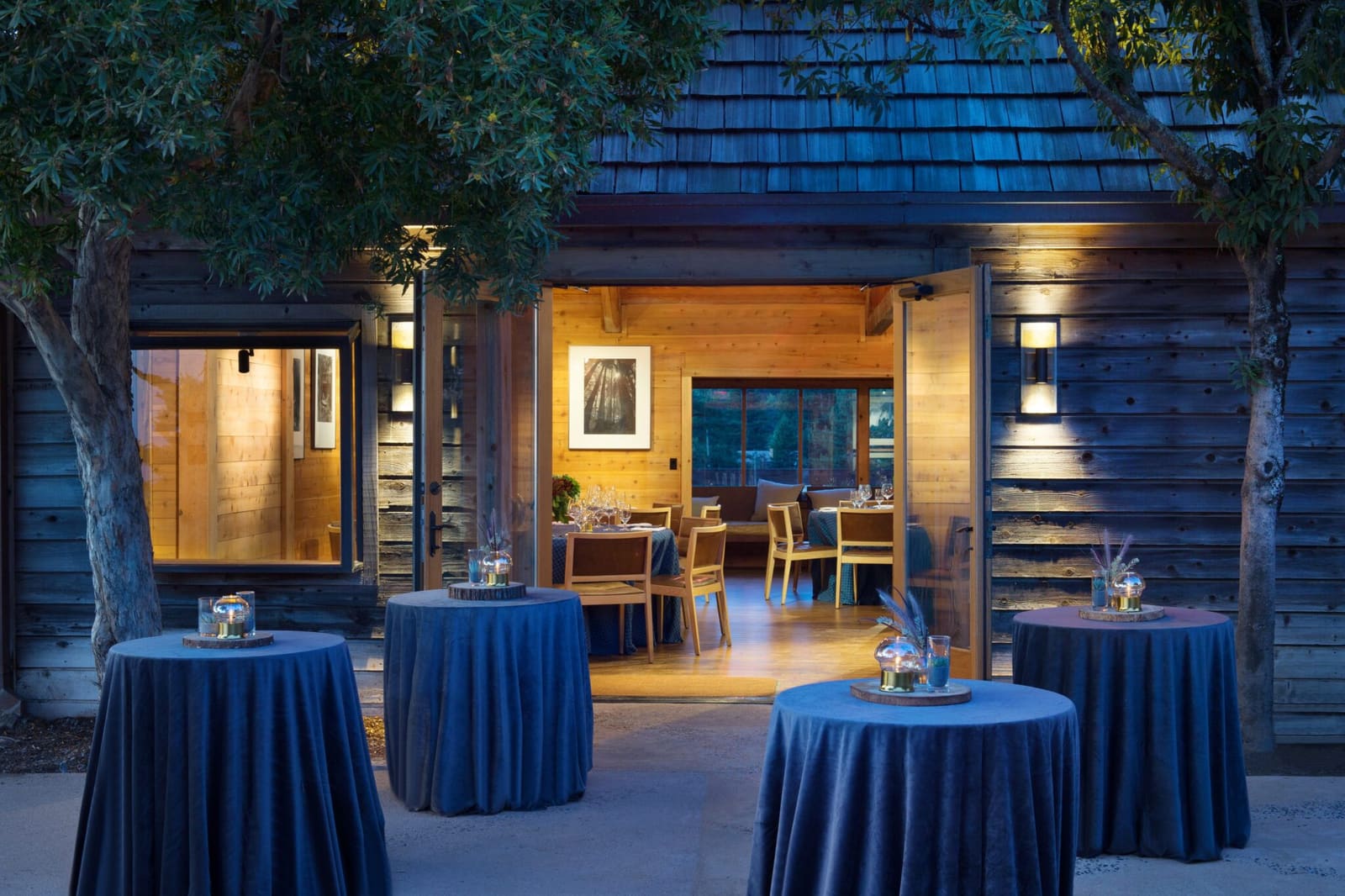 The Loft at dusk with its patio set for an evening reception